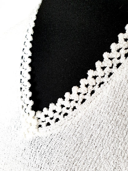 Einzigartiges und nachhaltiges Vintage T-Shirt in weiss. Unique and sustainable vintage t-shirt in white. Close-up.