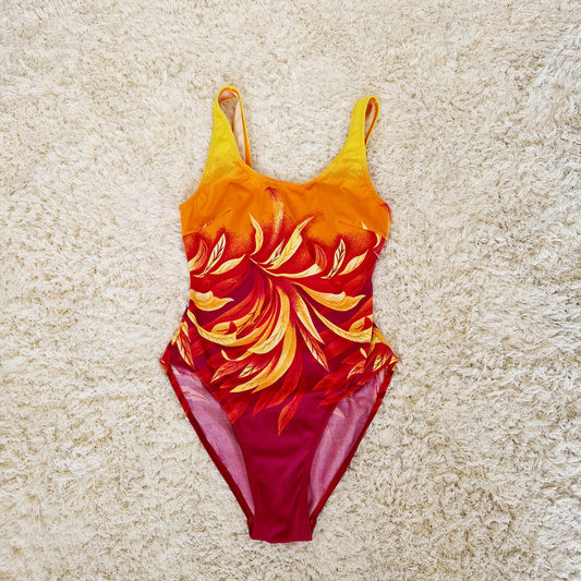 Einzigartiger und nachhaltiger Vintage Badeanzug in orange-rot. Unique and sustainable vintage swimsuit in orange-red.