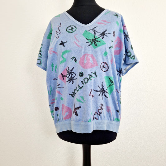 Einzigartiges und nachhaltiges Vintage T-Shirt mit Palmen, made in West-Germany. Unique and sustainable vintage t-shirt with palm trees, made in West-Germany. Front.