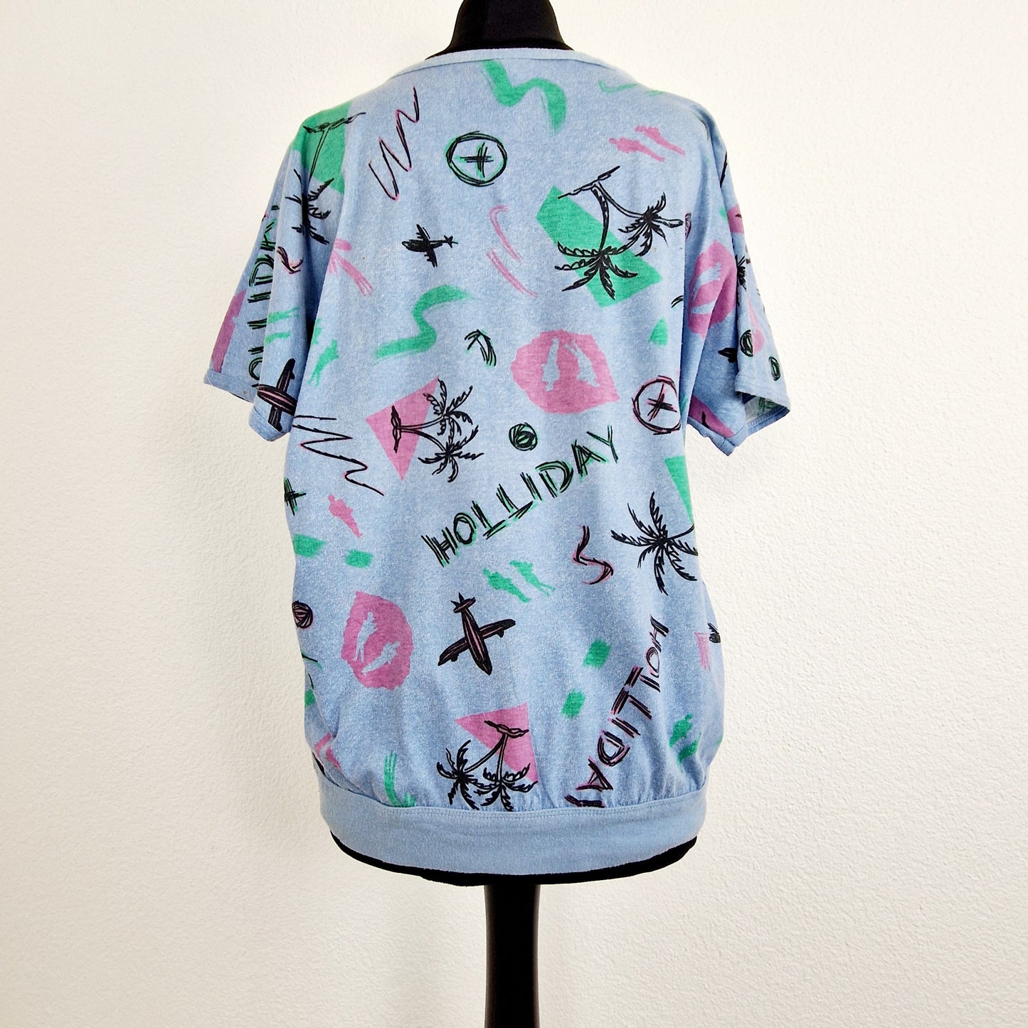 Einzigartiges und nachhaltiges Vintage T-Shirt mit Palmen, made in West-Germany. Unique and sustainable vintage t-shirt with palm trees, made in West-Germany. Back.