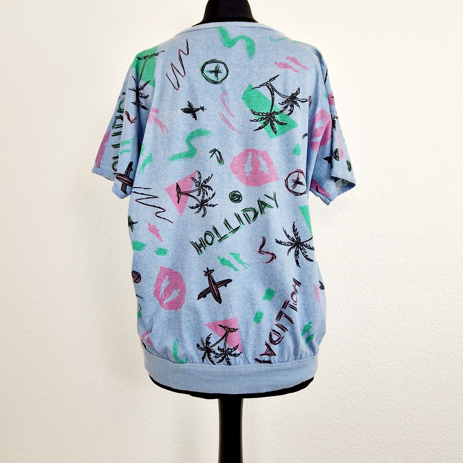 Einzigartiges und nachhaltiges Vintage T-Shirt mit Palmen, made in West-Germany. Unique and sustainable vintage t-shirt with palm trees, made in West-Germany. Back.