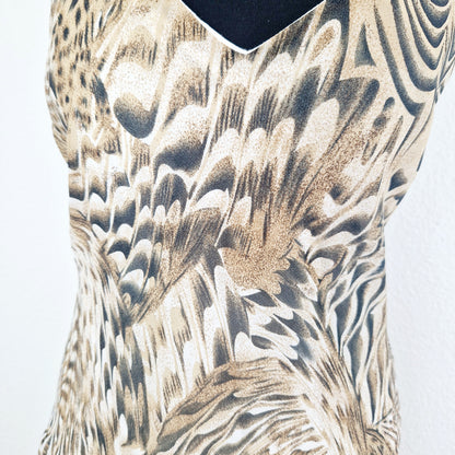 Einzigartiges und nachhaltiges Vintage Kleid in beige. Unique and sustainable vintage dress in beige. Close-up.