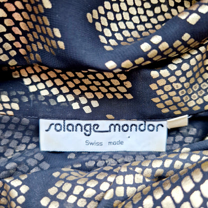 Einzigartige und nachhaltige Vintage Bluse in schwarz-gold. Unique and sustainable vintage blouse in black-gold. Tag.
