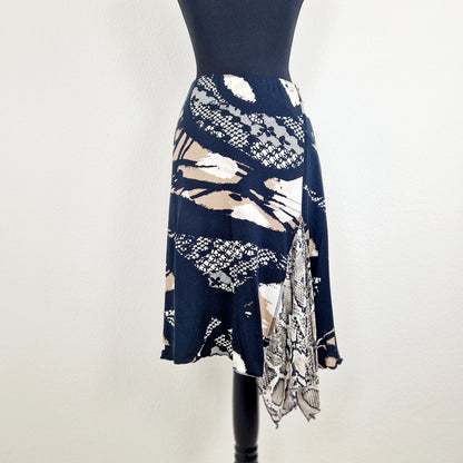 Einzigartiger und nachhaltiger Vintage Rock, asymmetrisch. Unique and sustainable vintage skirt, asymmetrical. Back.