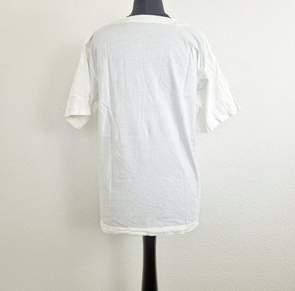 Einzigartiges und nachhaltiges Vintage T-Shirt mit Muscheln. Unique and sustainable vintage t-shirt with seashells. Back.