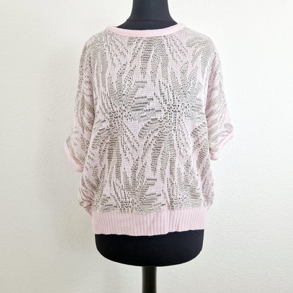 Einzigartiges und nachhaltiges Vintage T-Shirt in rosa-beige mit Palmen. Unique and sustainable vintage t-shirt in pink-beige with palm trees. Front. 