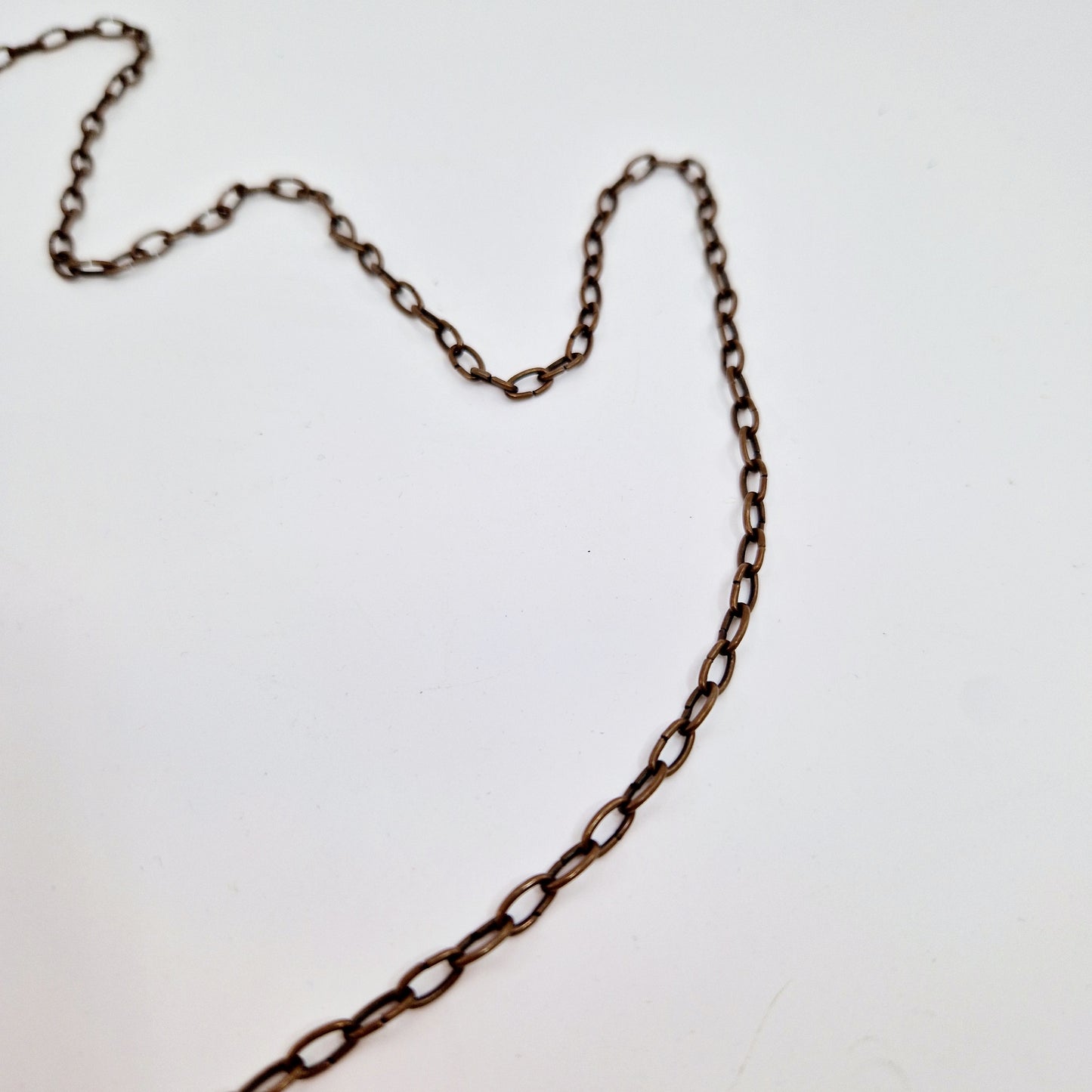 Einzigartige und nachhaltige Vintage Kette in Kupfer mit Anhänger. Unique and sustainable vintage necklace in copper with pendant. Chain.