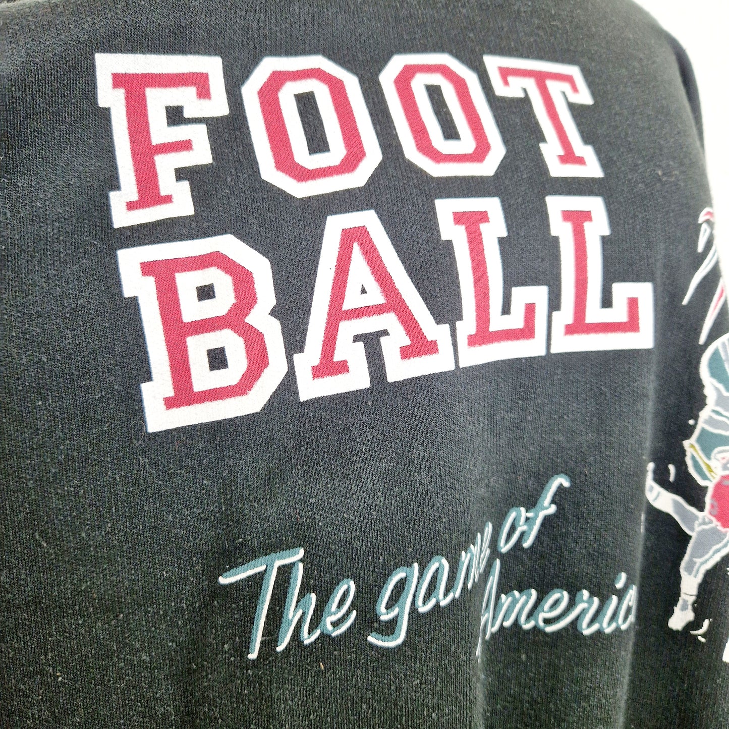 Einzigartiger und nachhaltiger Vintage Sweater, Football. Unique and sustainable vintage sweater, Football. Close-up.