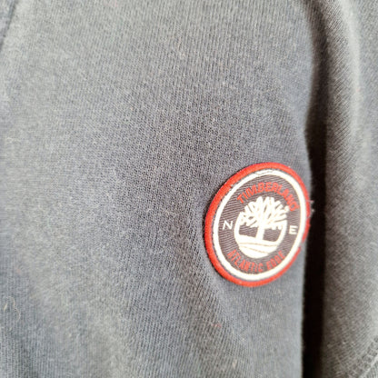 Einzigartiger und nachhaltiger Vintage Sweater Cardigan in blau von Timberland. Unique and sustainable vintage sweater cardigan in blue from Timberland. Close-up.