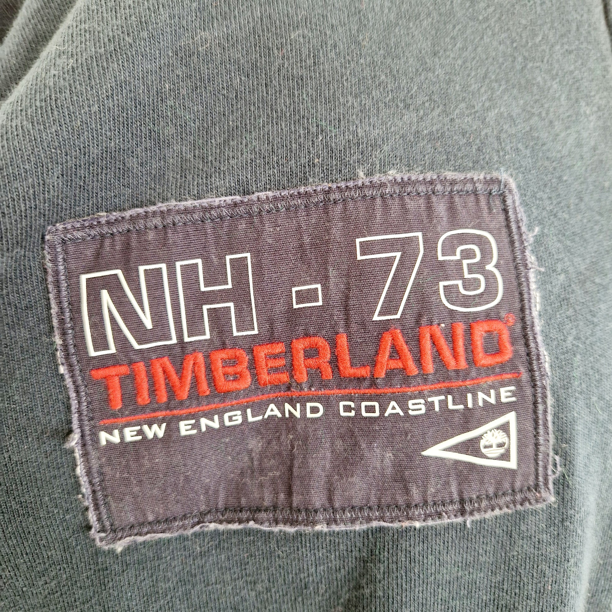 Einzigartiger und nachhaltiger Vintage Sweater Cardigan in blau von Timberland. Unique and sustainable vintage sweater cardigan in blue from Timberland. Close-up 2.