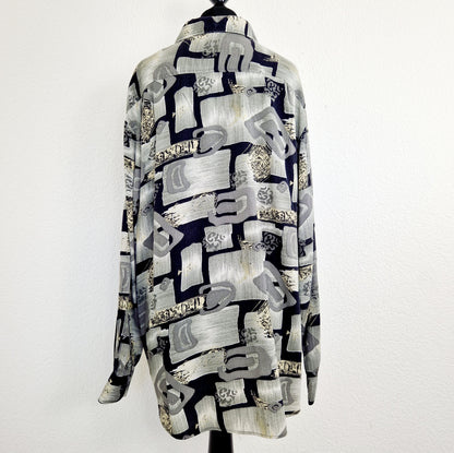 Einzigartiges und nachhaltiges Vintage Hemd in schwarz-grau-creme. Unique and sustainable vintage button-down in black-grey-creme. Back.