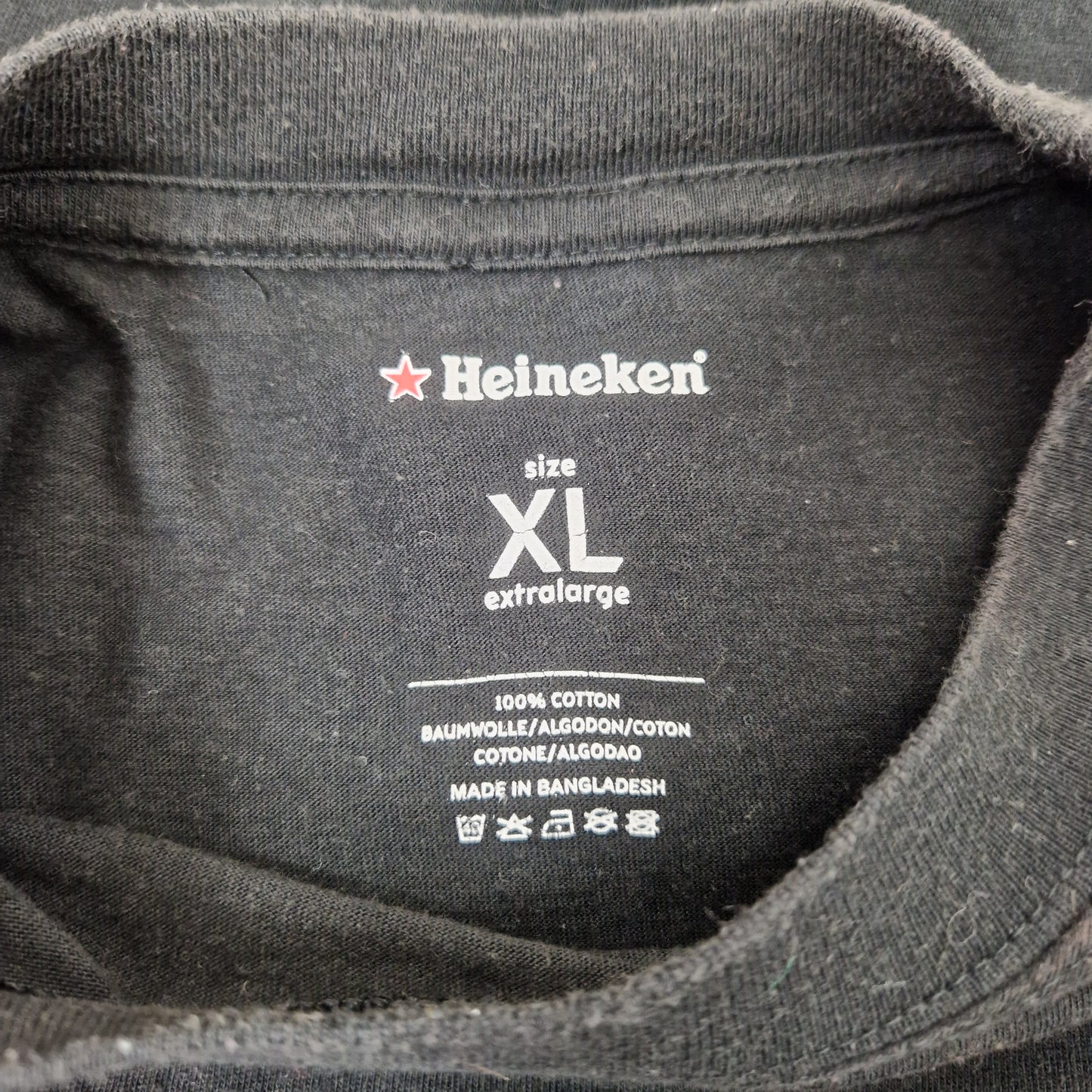 Einzigartiges und nachhaltiges Vintage T-Shirt Heineken. Unique and sustainable vintage t-shirt heineken. Tag.