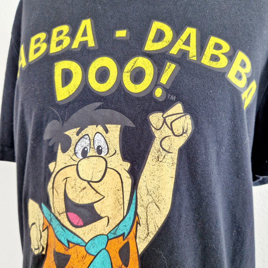 Einzigartiges und nachhaltiges Vintage T-Shirt mit Feuersteins. Unique and sustainable Vintage T-Shirt with the flintstones. Close-up.