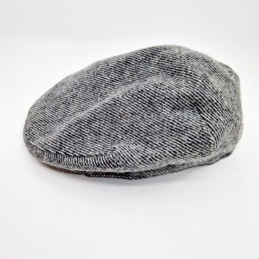 Einzigartige und nachhaltige Vintage Schiebermütze in grau. Unique and sustainable vintage flat cap in grey. Side. 