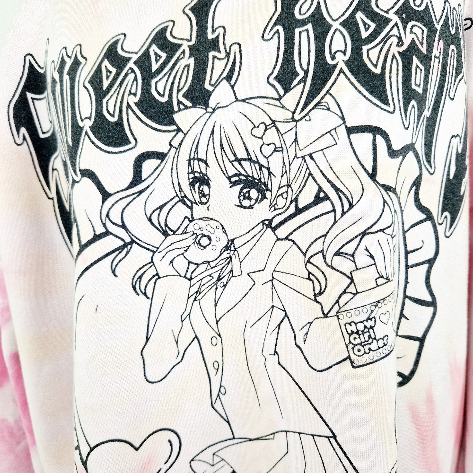 Einzigartiger und nachhaltiger Vintage Sweater mit Manga. Unique and sustainable vintage sweater with manga. Close-up.