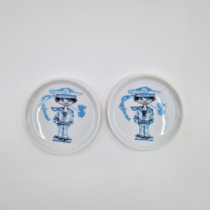 2 einzigartige und nachhaltige Vintage Untersetzer in weiss-blau von Fürstenbeg. 2 unique and sustainable vintage coasters in white-blue from Fürstenberg. Above.