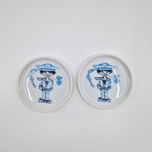2 einzigartige und nachhaltige Vintage Untersetzer in weiss-blau von Fürstenbeg. 2 unique and sustainable vintage coasters in white-blue from Fürstenberg. Above.