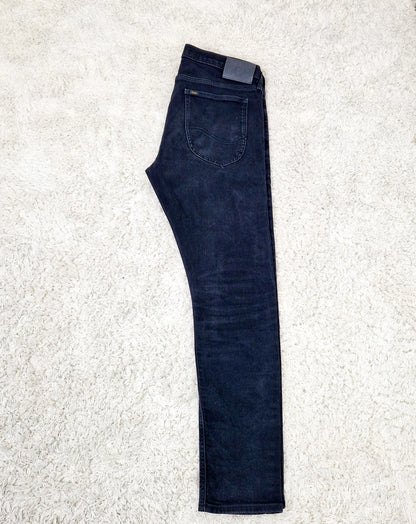 Einzigartige und nachhaltige Vintage Jeans in schwarz von Lee, Luke. Unique and sustainable vintage jeans in black from Lee, Luke. Side.