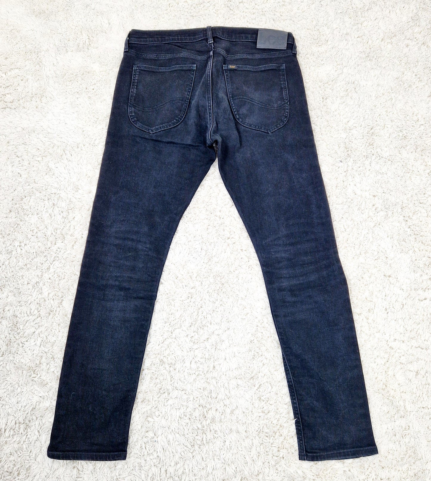 Einzigartige und nachhaltige Vintage Jeans in schwarz von Lee, Luke. Unique and sustainable vintage jeans in black from Lee, Luke. Back.