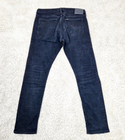 Einzigartige und nachhaltige Vintage Jeans in schwarz von Lee, Luke. Unique and sustainable vintage jeans in black from Lee, Luke. Back.