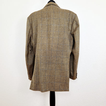Einzigartiger und nachhaltiger Vintage Blazer in braun-blau, kariert. Unique and sustainable vintage blazer in brown-blue, checked. Back.