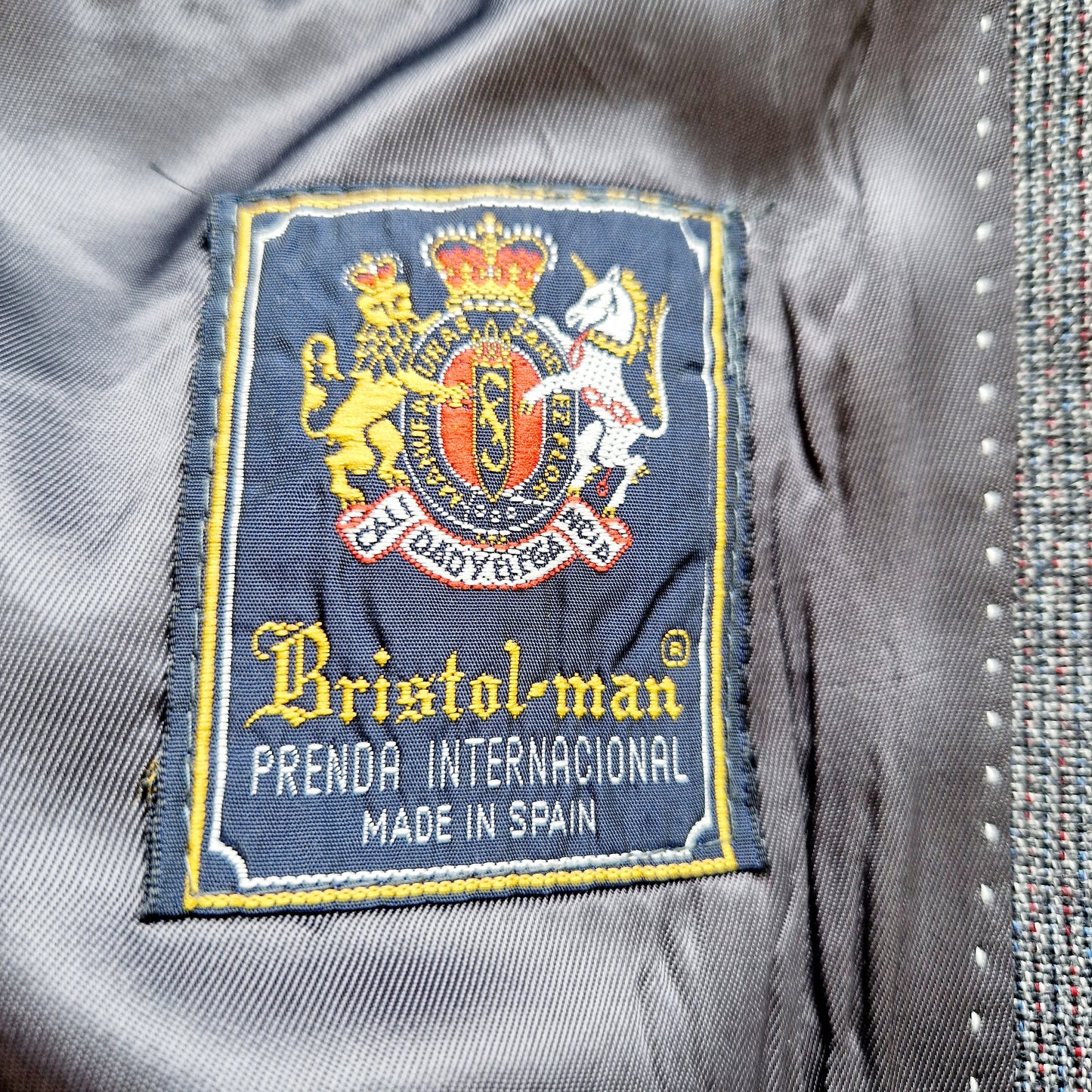Einzigartiger und nachhaltiger, melierter Vintage Blazer in anthrazit-blau-rot. Tag.