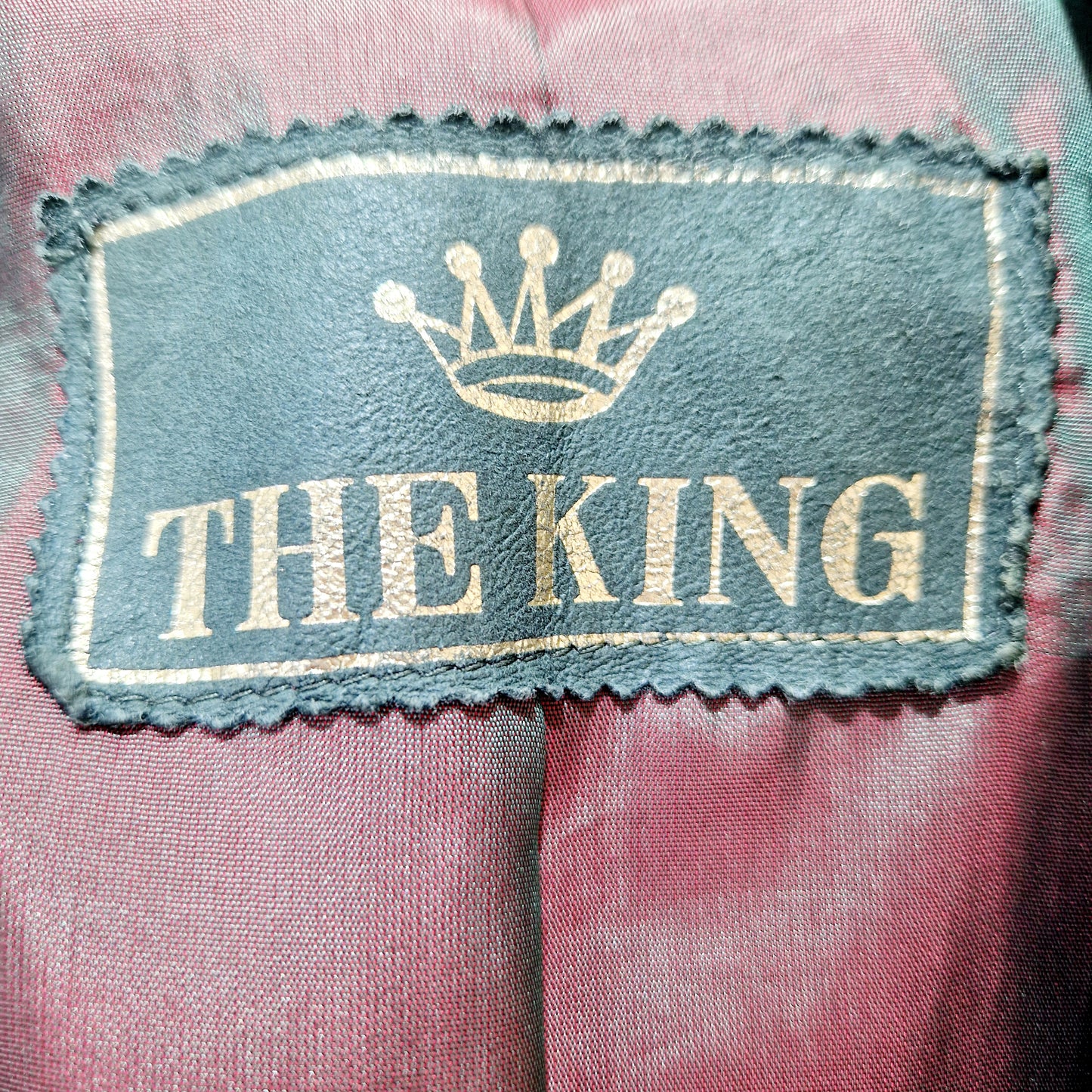 Einzigartiger und nachhaltiger Vintage Blazer in grün, Leder. Tag.