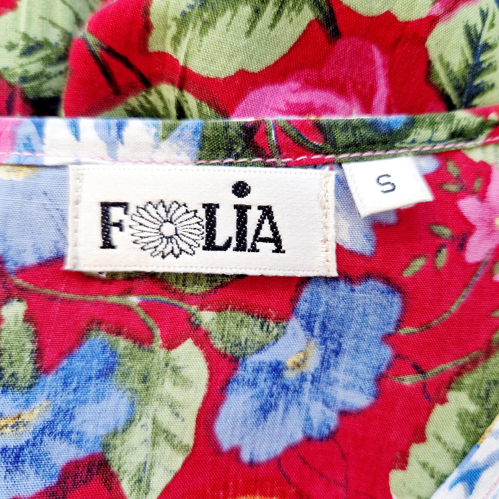 Einzigartiger und nachhaltiger Vintage Playsuit in pink-blau-weiss mit Blumen. Unique and sustainable vintage playsuit in pink-blue-white with flowers. Tag.