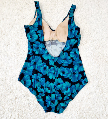 Einzigartiger und nachhaltiger Vintage Badeanzug in petrol-schwarz mit Blumen. Unique and sustainable vintage swimsuit in petrol-black with flowers. Back.