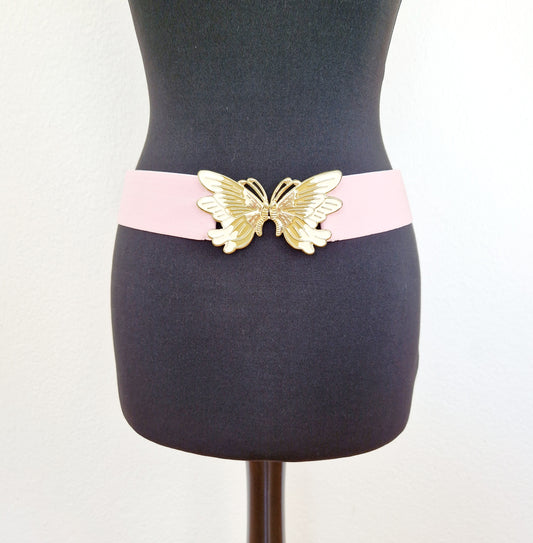 Einzigartiger und nachhaltiger Vintage Gürtel in rosa-gold mit Schmetterling. Unique and sustainable vintage belt in pink-gold with a butterfly. Front.