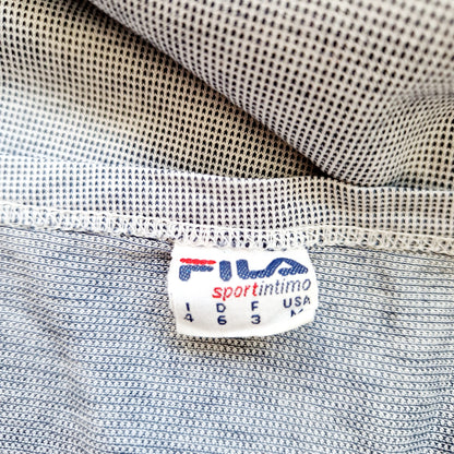 Einzigartiges und nachhaltiges Vintage Top in blau-weiss von FILA. Unique and sustainable vintage top in blue-white from FILA. Tag.