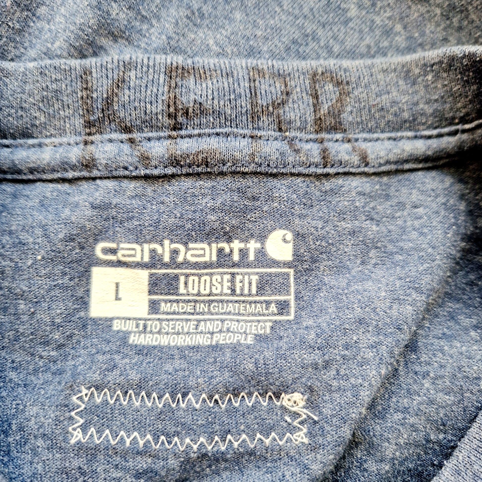 Einzigartiges und nachhaltiges Vintage Shirt in blau von Carhartt. Unique and sustainable vintage shirt in blue from Carhartt. Tag.