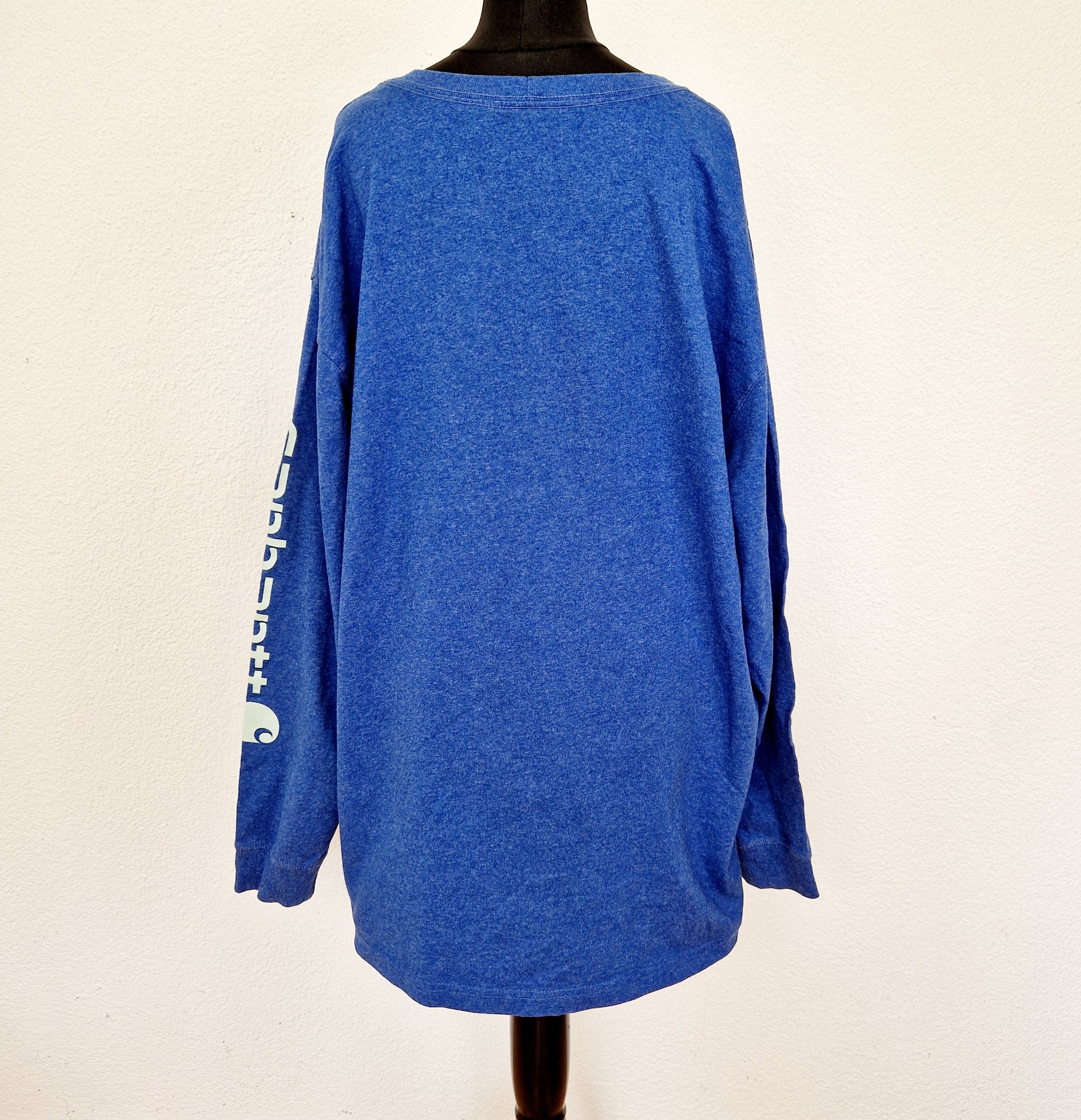 Einzigartiges und nachhaltiges Vintage Shirt in mittelblau von Carhartt. Unique and sustainable vintage shirt in medium blue from Carhartt. Back.