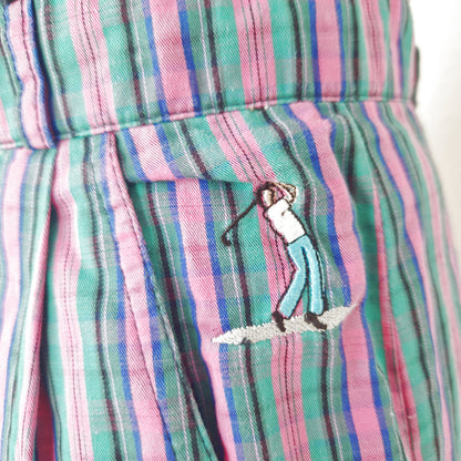 Einzigartige und nachhaltige karierte Vintage Hose in pink-grün-blau. Front. Close-up.