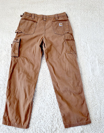 Einzigartige und nachhaltige Vintage Hose in caramell von Carhartt. Unique and sustainable vintage pants in caramell from Carhartt. Back.