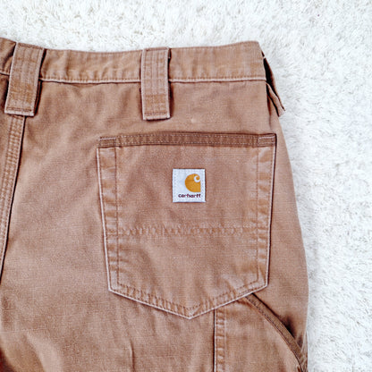 Einzigartige und nachhaltige Vintage Hose in caramell von Carhartt. Unique and sustainable vintage pants in caramell from Carhartt. Tag.