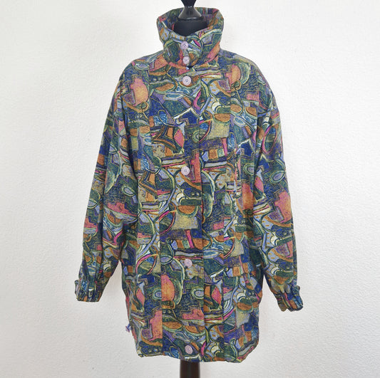 Einzigartige und nachhaltige Vintage Jacke in grün-blau-pink mit Schulterpolstern. Unique and sustainable vintage jacket in green-blue-pink with shoulder pads. Front.