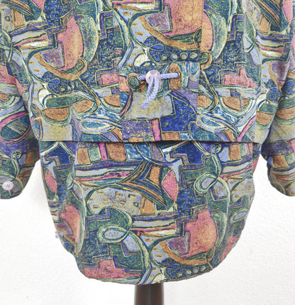 Einzigartige und nachhaltige Vintage Jacke in grün-blau-pink mit Schulterpolstern. Unique and sustainable vintage jacket in green-blue-pink with shoulder pads. Close-up Back.