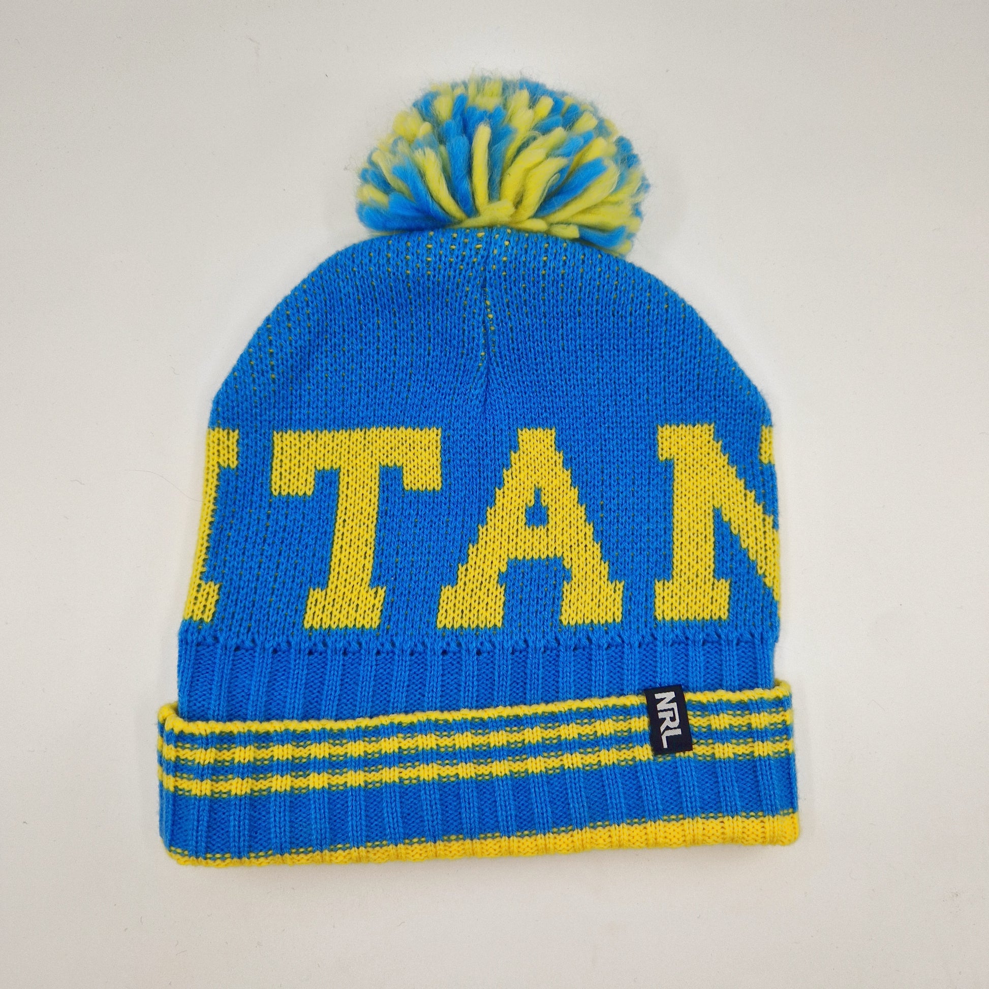 Einzigartige und nachhaltige Vintage Mütze/Beanie in hellblau-gelb, Titans. Unique and sustainable vintage beanie in light blue-yellow, Titans. Back.