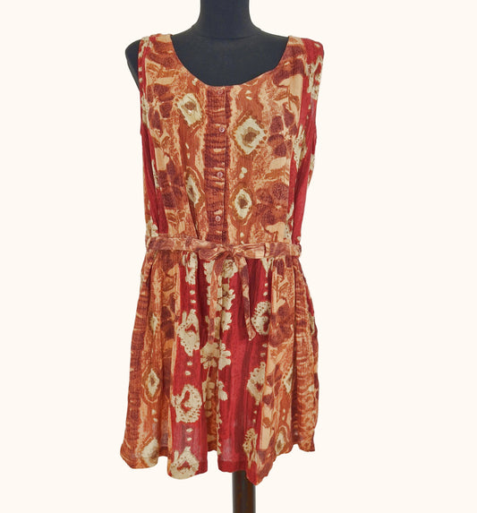 Einzigartiger und nachhaltiger Vintage Jumpsuit in braun-rot-orange mit Ethno-Muster. Front.