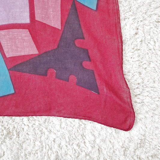 Einzigartiges und nachhaltiges Vintage Tuch in bordeaux-türkis-lila mit geometrischen Formen. Ecke.