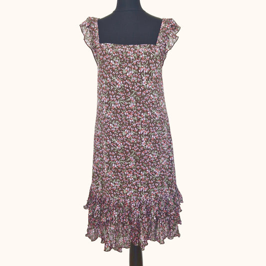 Einzigartiges und nachhaltiges Vintage Trägerkleid in braun-lila-rot mit Blumen und Rüschenärmeln. Front.