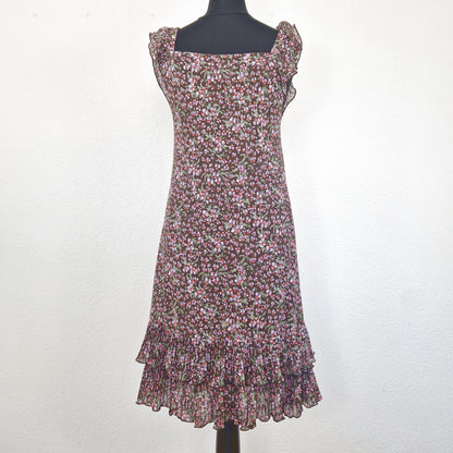 Einzigartiges und nachhaltiges Vintage Trägerkleid in braun-lila-rot mit Blumen und Rüschenärmeln. Back.