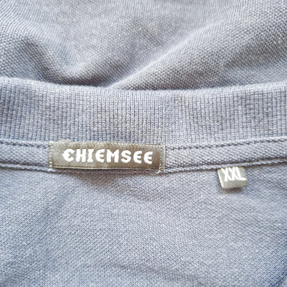 Einzigartiges und nachhaltiges Vintage Poloshirt in dunkelblau von Chiemsee. Tag.