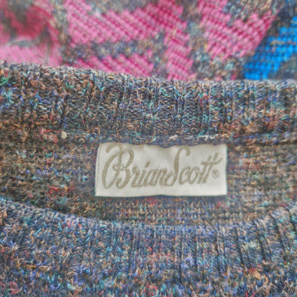Einzigartiger und nachhaltiger Vintage Pulloverin anthrazit-pink-blau mit geometrischem Muster. Tag.